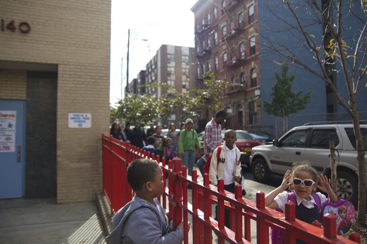 Children chat with each other as they walk out of school on a Thursday afternoon. (SWATI GUPTA / Bronx Ink)