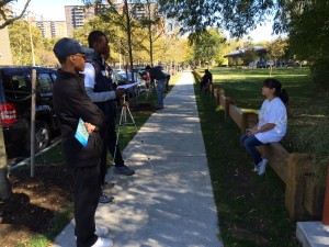The Kaba brothers interview Wanda Diaz about her experience at "It's My Park Day" (ELIZABETH GOLDBAUM/THE BRONX INK)